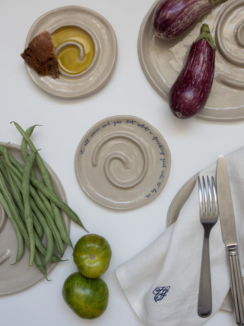 'IT ALL COMES AND GOES' Spiral Plate