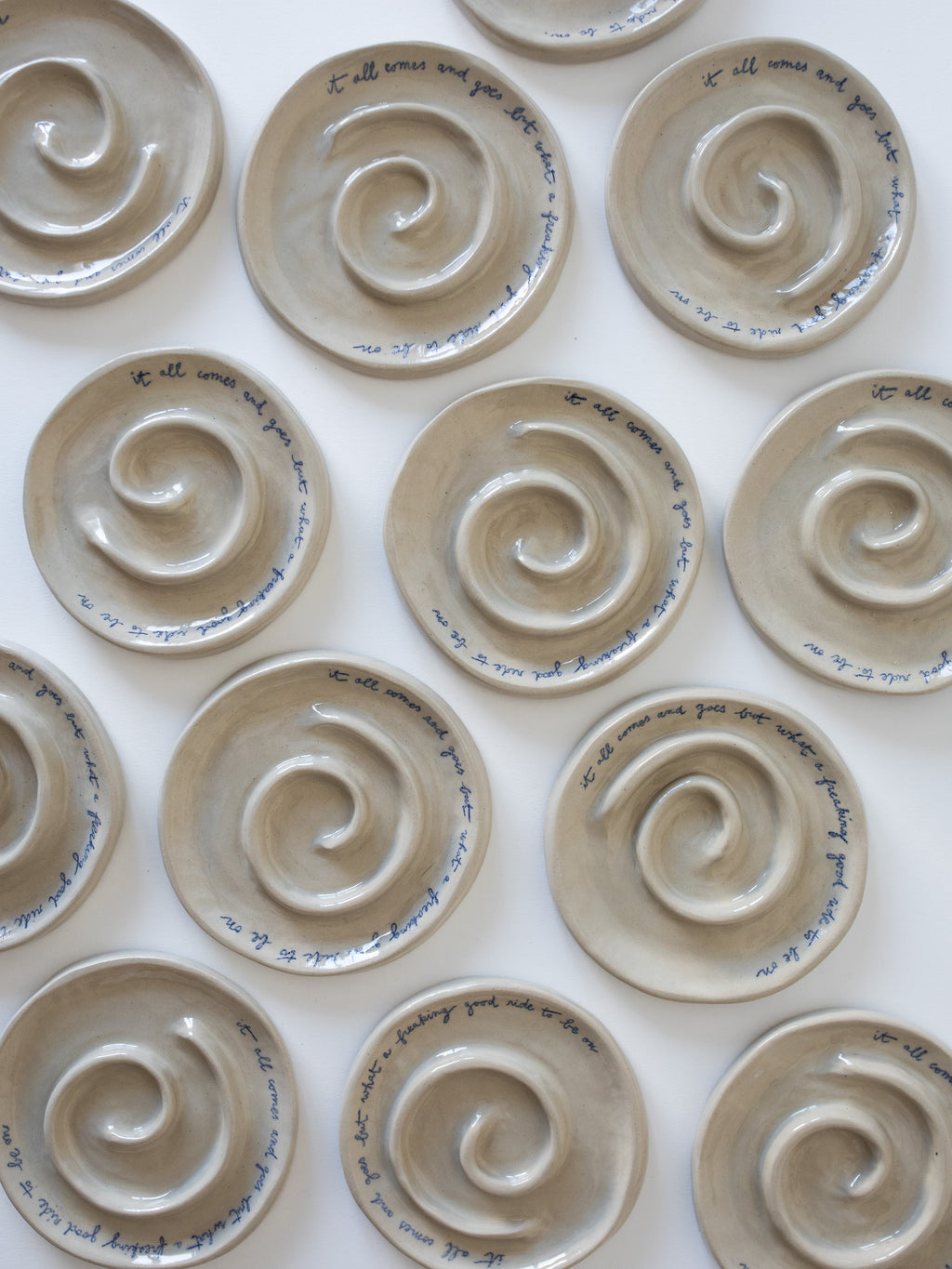 'IT ALL COMES AND GOES' Spiral Plate